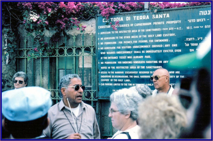 A sign with the rules of conduct and appearance at Capernaum